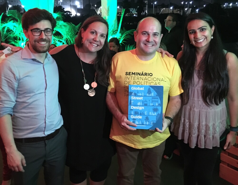Picture of GDCI staff and the Mayor of Fortaleza holding the Global Streets Design Guide
